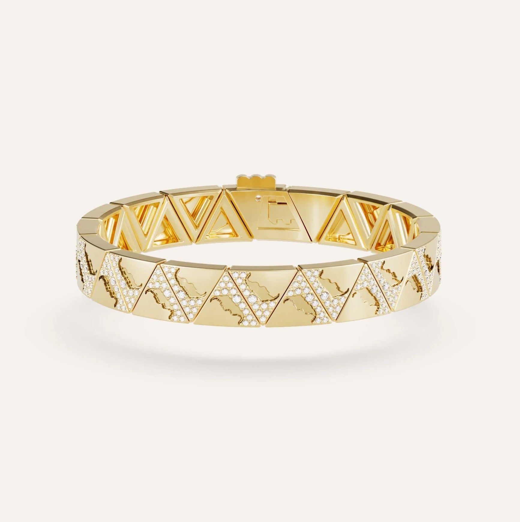 Gold bracelet with geometric pattern on a white background