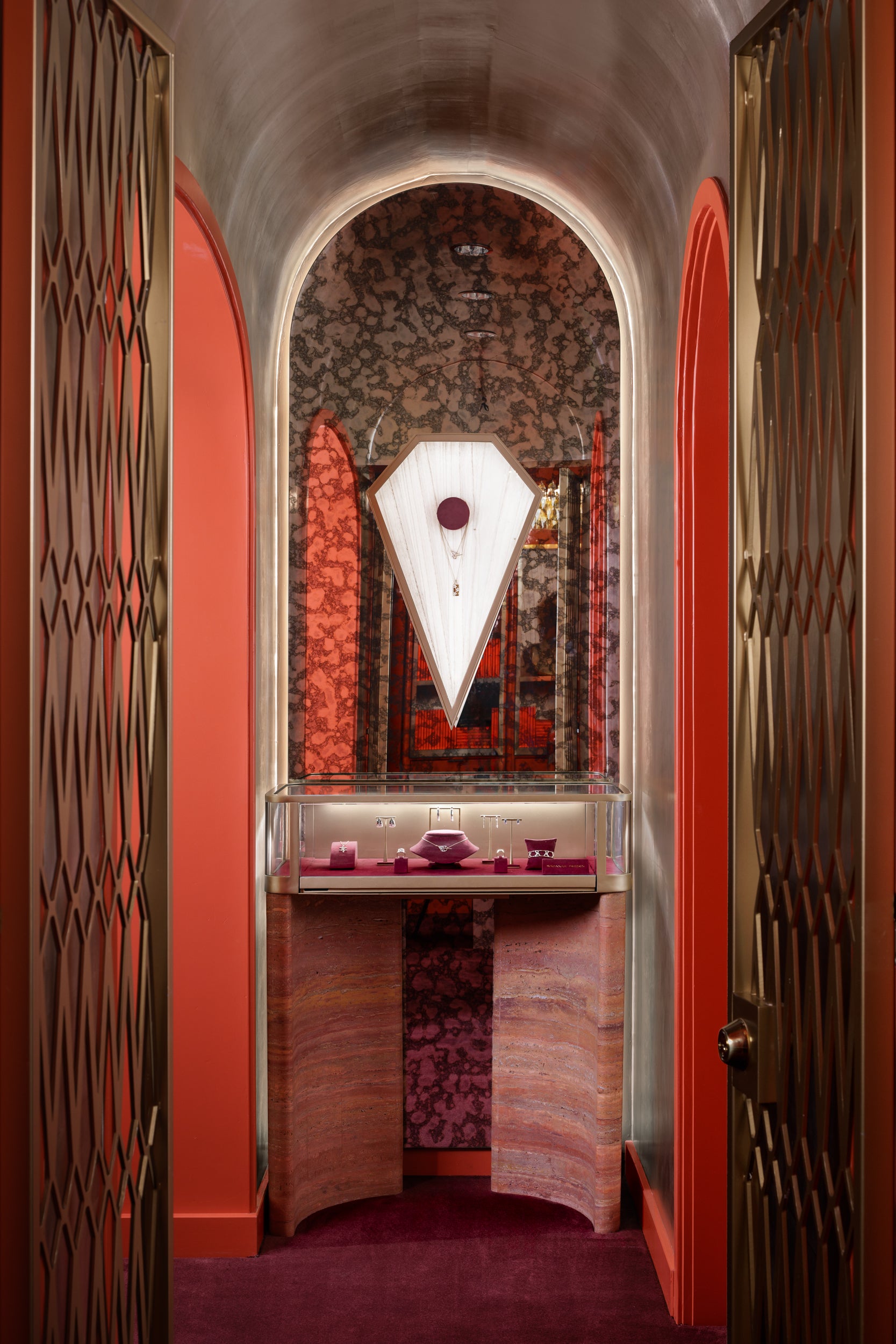 Decorative interior with a central archway featuring a geometric design.