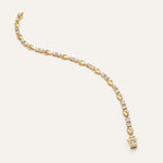 Gold bracelet with diamond accents on a white background