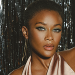 Woman wearing threader earrings