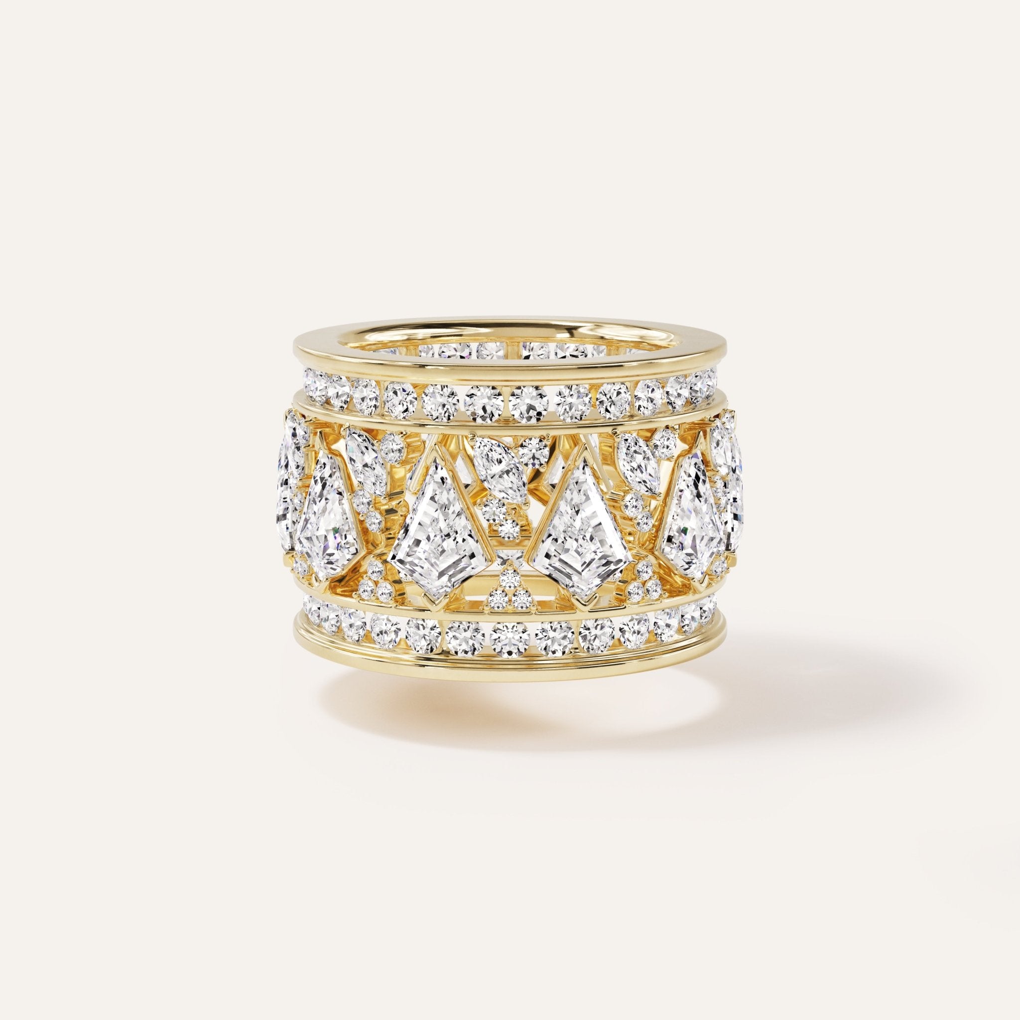 14k yellow gold two-piece puzzle ring featuring a wide openwork band set with approximately 7 carats of mixed fancy-cut lab-grown diamonds — including kite, pear, and square shapes — flanked by double rows of pavé round brilliant diamonds at the upper and lower edges.