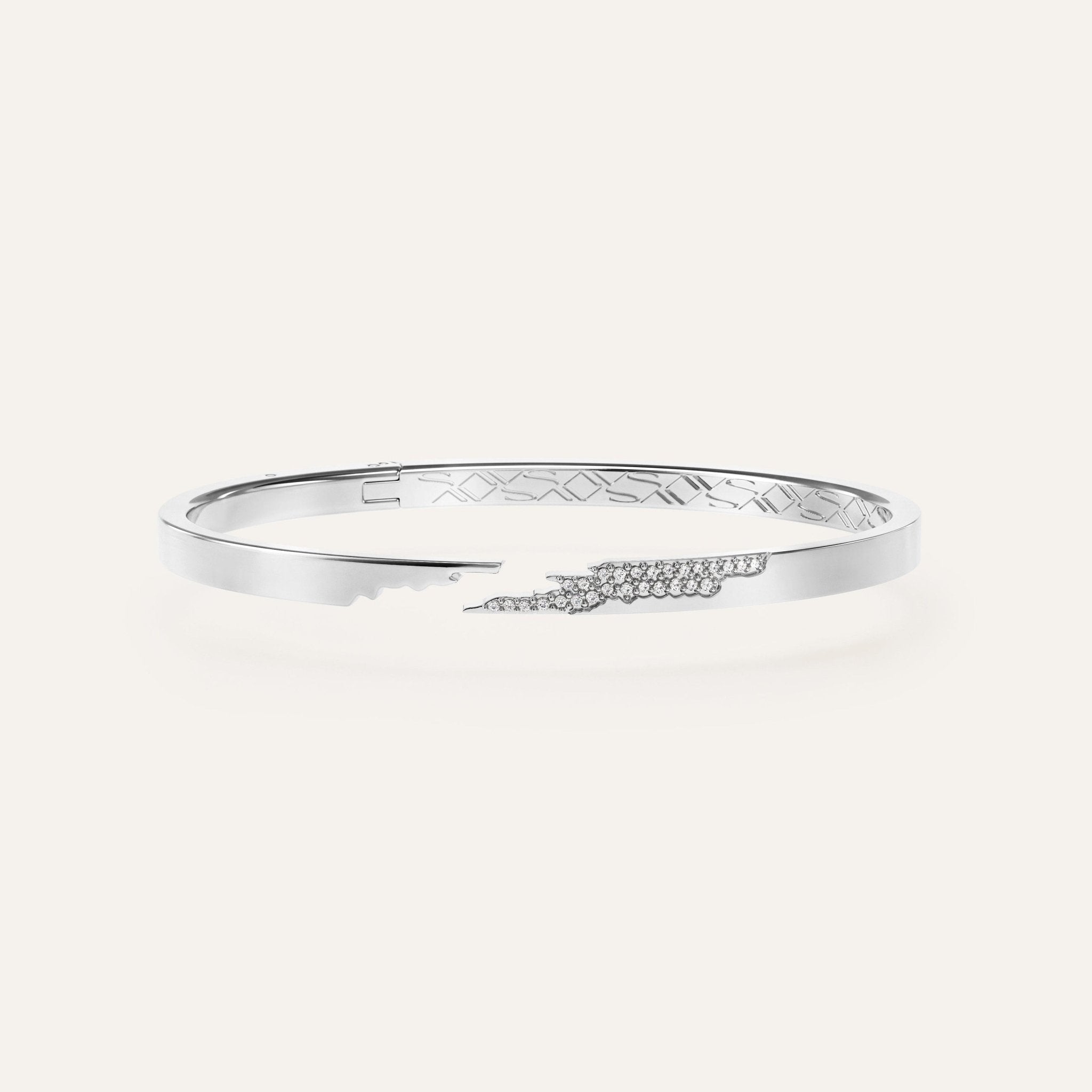 Savannah Friedkin 14k white gold cuff bracelet with lab grown diamonds in a pave layout. 