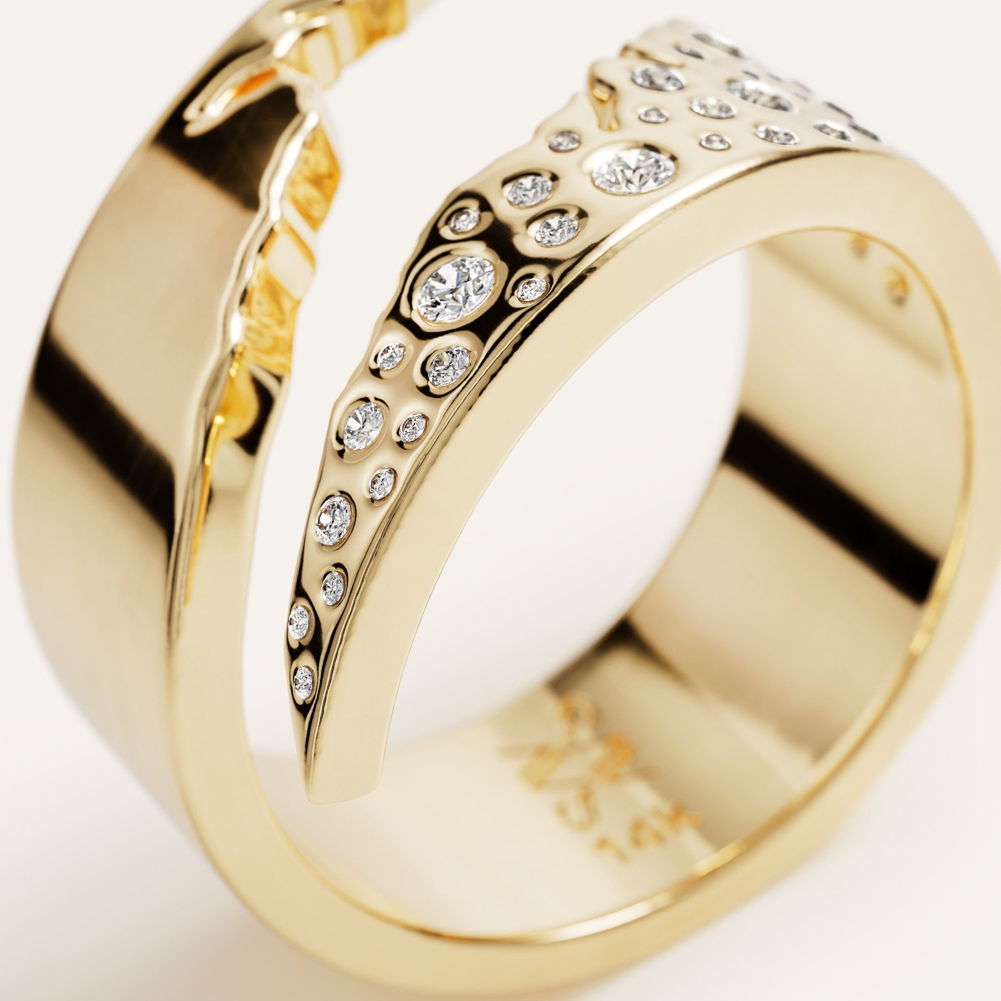 Gold ring with diamond accents on a white background