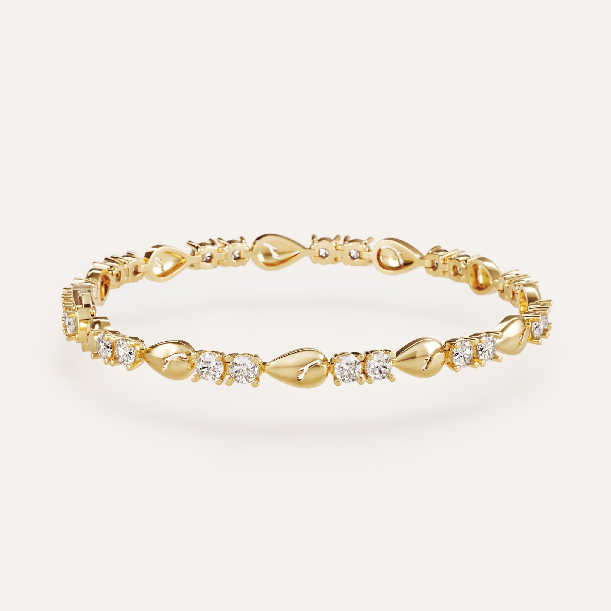 Gold bracelet with diamond accents on a light background