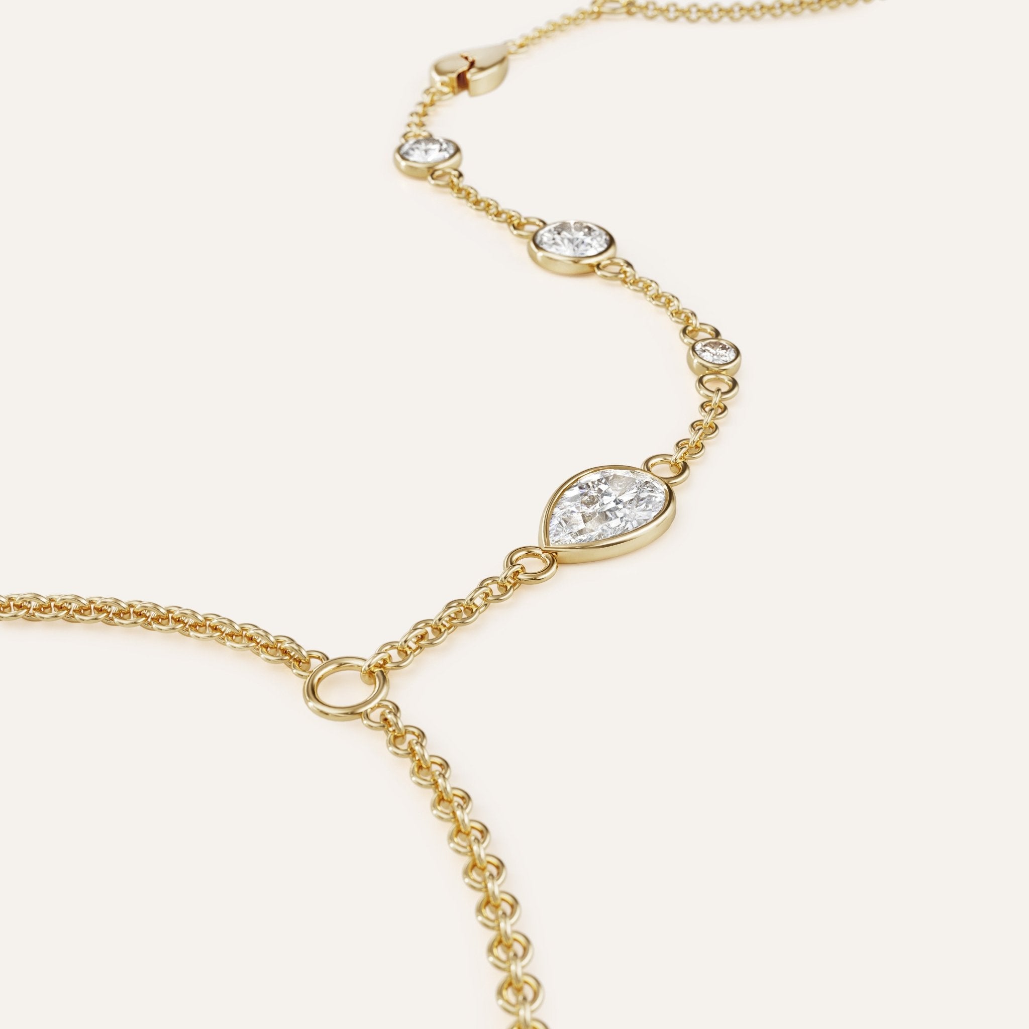 Gold bracelet with diamond accents on a white background