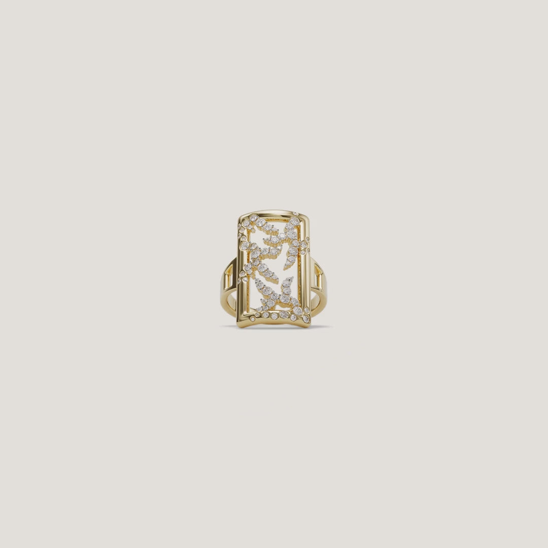 Video showcasing the 14k yellow gold SAV diamond rectangle cocktail ring, highlighting the openwork diamond monogram, bezel-set frame border, and split shank band from multiple angles.