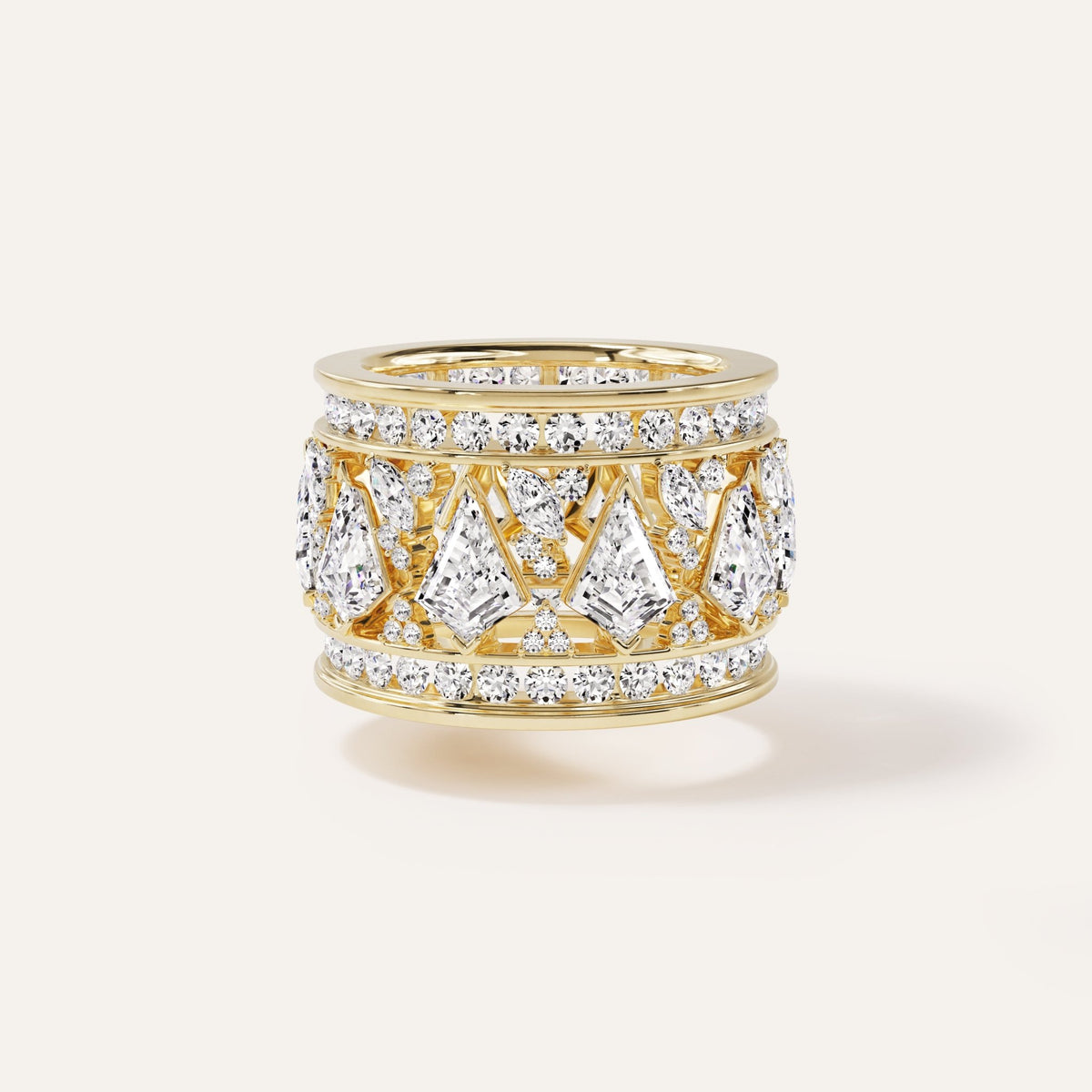 14k yellow gold two-piece puzzle ring featuring a wide openwork band set with approximately 7 carats of mixed fancy-cut lab-grown diamonds — including kite, pear, and square shapes — flanked by double rows of pavé round brilliant diamonds at the upper and lower edges.